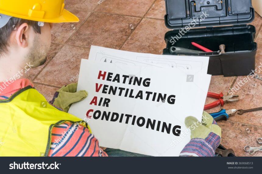 stock-photo-repairman-is-looking-at-documentation-of-hvac-heating-ventilating-air-conditioning-369068513